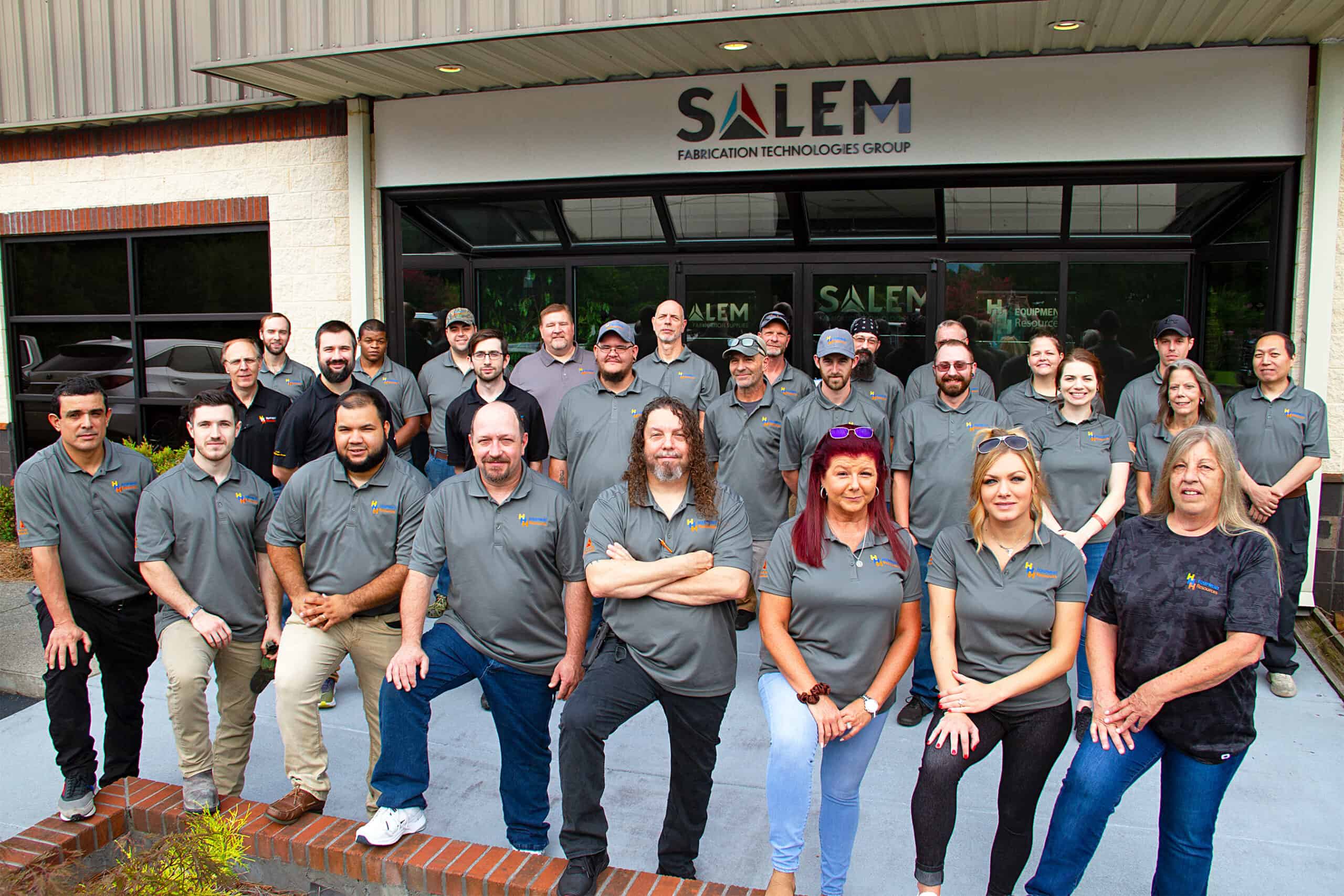 Group of HHH employees standing in front of Salem FTG office