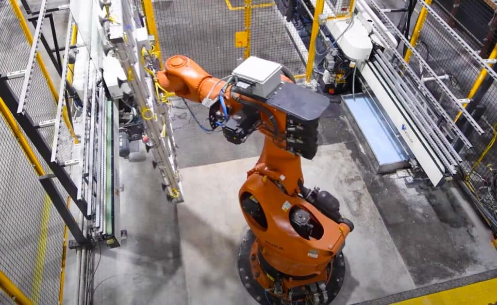 Kodiak robotic arm moving glass sheets